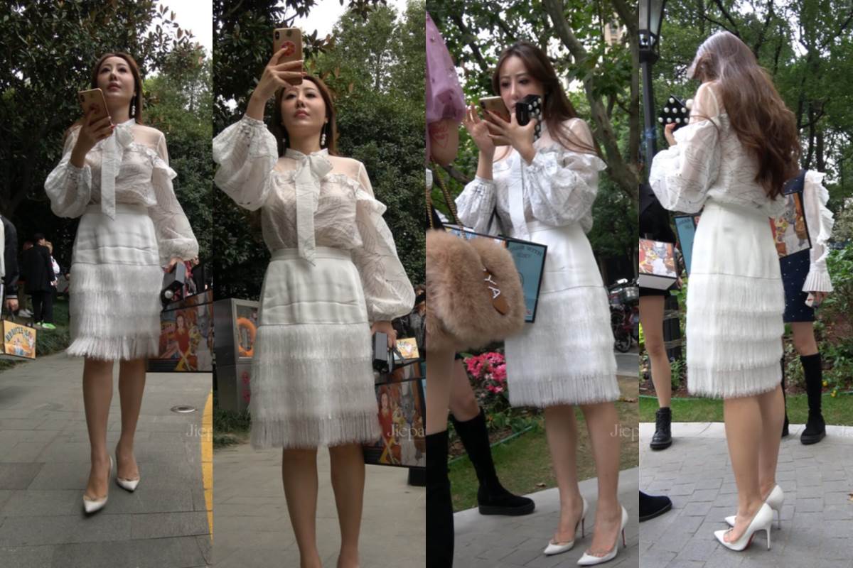 4K - 街拍白裙白高跟气质美女 [901 MB/MP4]