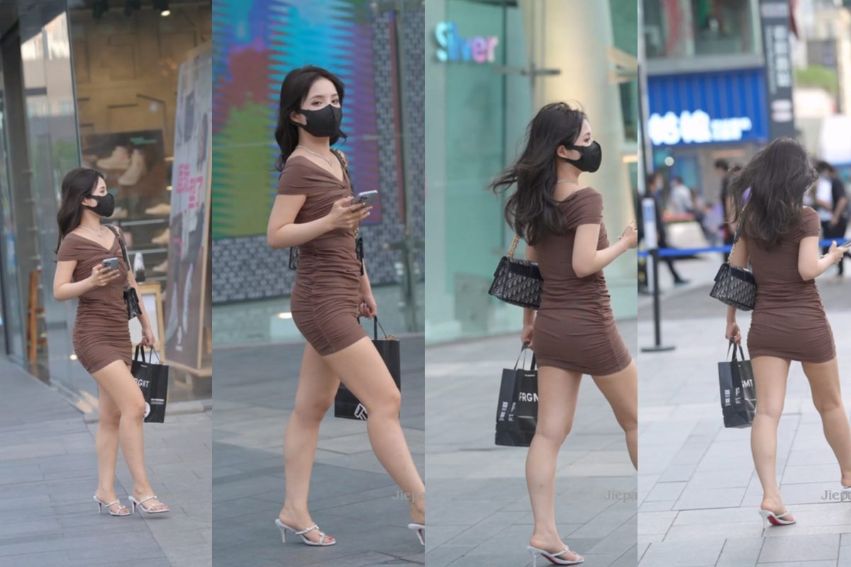 街拍棕色包臀裙长腿美女