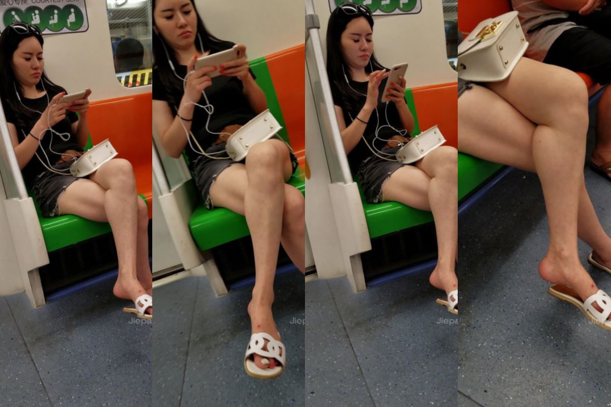 4K - 街拍地铁上玩手机的黑色T恤美姐 [701 MB/MP4]