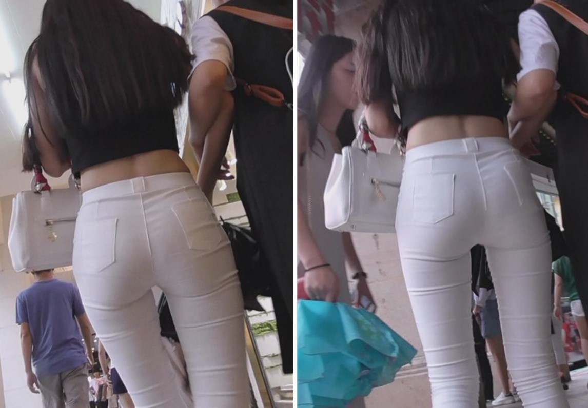 街拍超级紧绷白裤露脐装美眉 [1.73 GB]