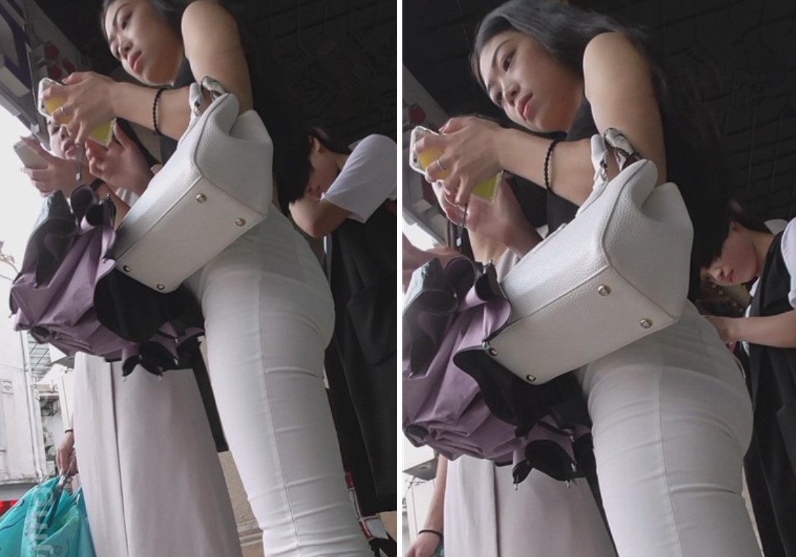 街拍超级紧绷白裤露脐装美眉 [1.73 GB]