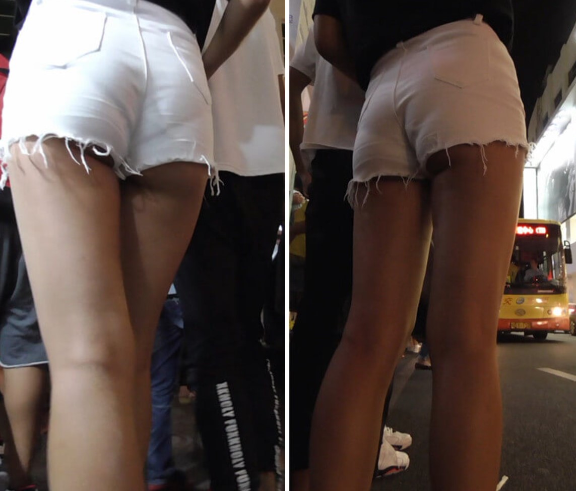 街拍白短热牛小美眉 [387 MB]