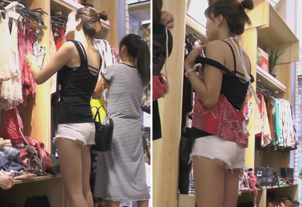 街拍白短热裤笑容灿烂美女逛服装店 [953 MB]