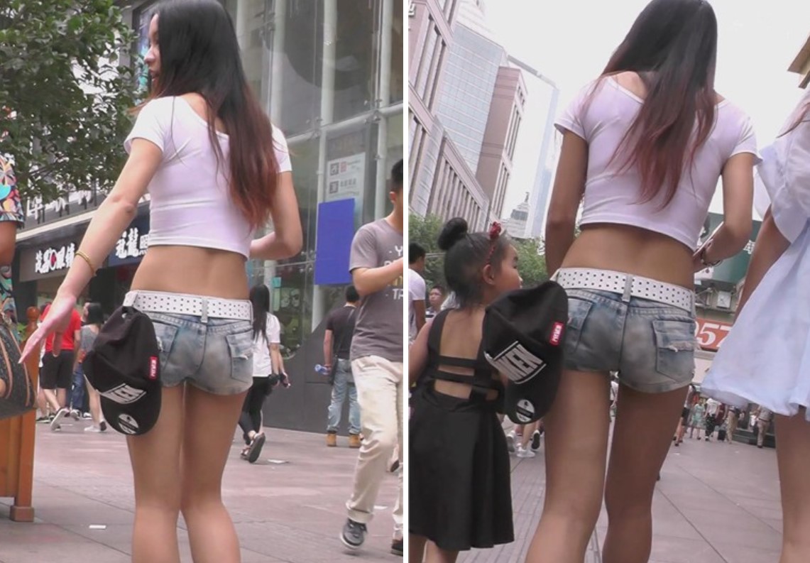 街拍性感小蛮腰露脐短裤丰满美少妇 [744 MB]