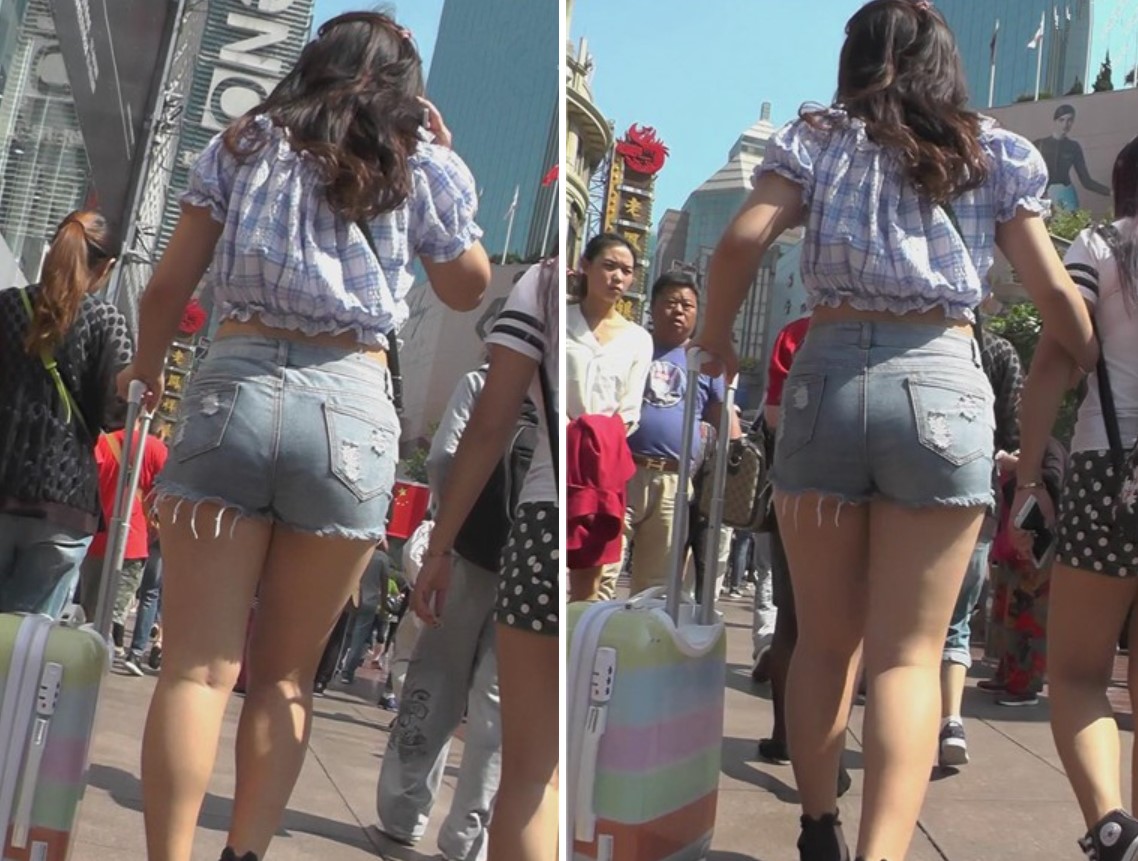 拖着行李箱的高腰热裤美眉 [956 MB]